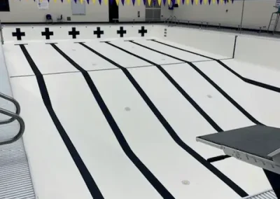 Two Rivers Pool shot left side behind swimmers block with the new liner installed